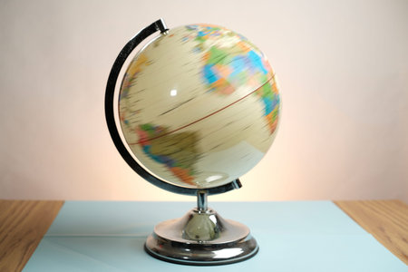 Basra, Iraq- March 04, 2026: Arabic Language Educational World Globe Displayed on Chrome Metal Stand