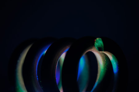 Glowing Neon Purple And Blue Helical Spring Coil Macro Photography