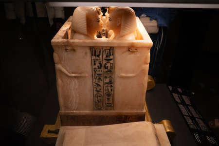 Title: Cairo, Egypt- February 01, 2026: Ancient Alabaster Canopic Chest of King Tutankhamun Featuring Hieroglyphic Inscriptionsのeditorial素材