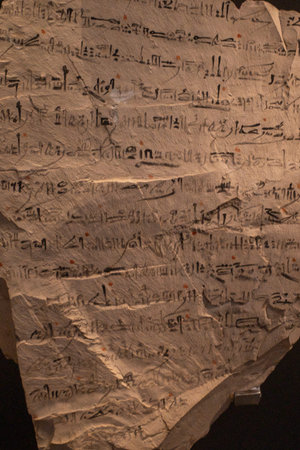Cairo, Egypt- February 01, 2026: Ancient Egyptian Pottery Ostraca Fragments with Hieratic Script and...