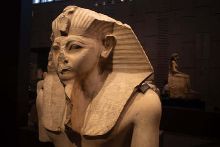 Cairo, Egypt- February 01, 2026: Majestic Black Granite Pharaoh Statue Headpiece Displayed in Modern...
