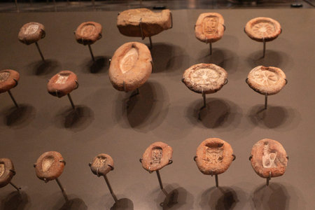 Cairo, Egypt- February 01, 2026: Collection of Ancient Egyptian Stone Molds and Clay Foundation...