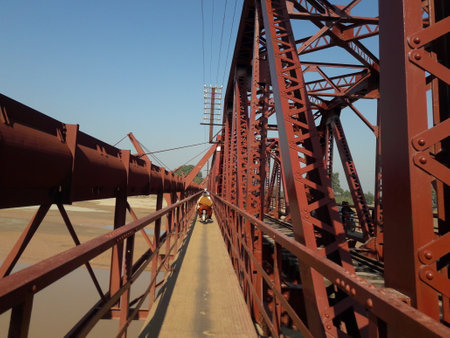 Bridge across the river, close-up, view from below.の写真素材