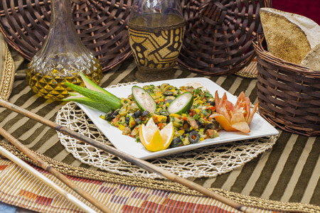 Lebanese salad contains olives, lemon, cucumber and cornの写真素材