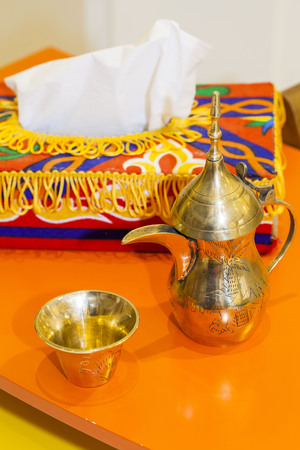 Arabic coffee pot"Dallah" and cupの写真素材