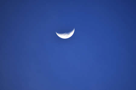 Half Moon in the blue backgroundの写真素材