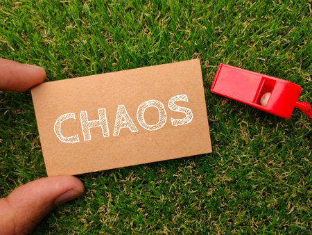 Glasses,magnifying glass and wooden puzzle written with text SELF IMPROVEMENT on wooden table background.の写真素材