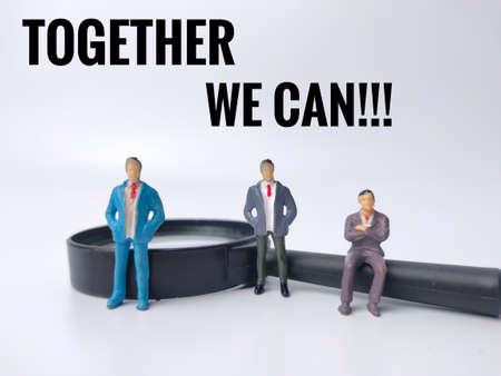 Compass keychain and colored sticky note written with text CARRAGEENAN on red background.の写真素材