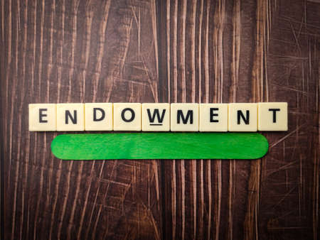 Top view clock and colored notebook with text COLLABORATION PLATFORM on wooden backgroundの写真素材