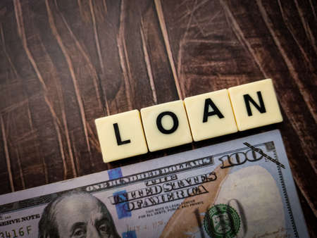 Stock word made of square letter word on wooden backgroundの写真素材