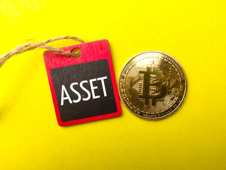 World globe,calculator,banknotes,compass and notebook with text International Monetary Fund on blue background.の写真素材