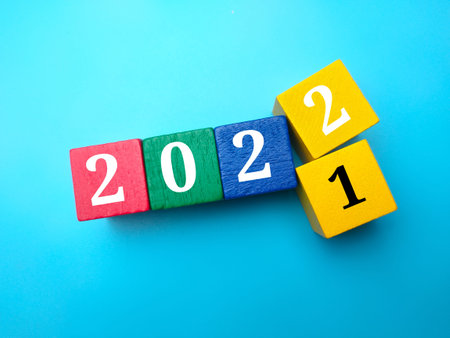 Bitcoins and world globe on a yellow background with copy space.の写真素材