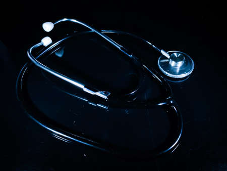 Selective focus.Word BIG MONEY on color paper with dollar banknote on gray background.Business concept.の写真素材