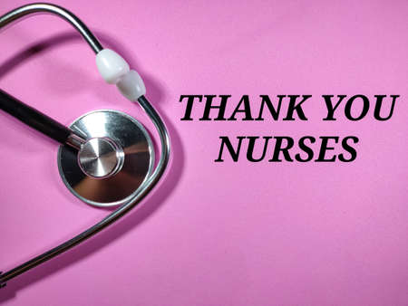 Selective focus.Word FLSA (Fair Labour Standards Act) on black board with stethoscope on yellow background.Medical concept.の写真素材