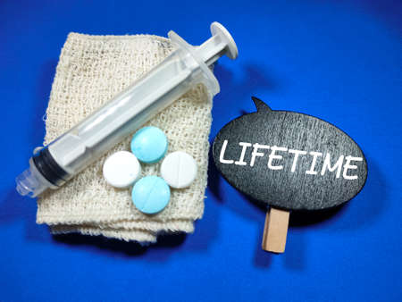 Word SMALL BUSINESS on notebook with pencil and calculator on black and colorful paper background.Business concept.の写真素材