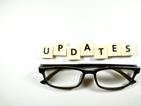 Selective focus.Word NEVER LOOK BACK with magnifying glass on white background.Business concept.