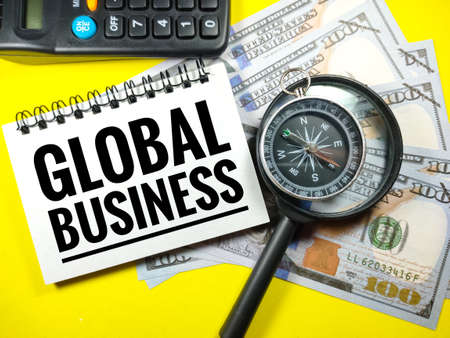 Selective focus.Word INCENTIVE with jigsaw puzzle on yellow background.Business concept.の写真素材