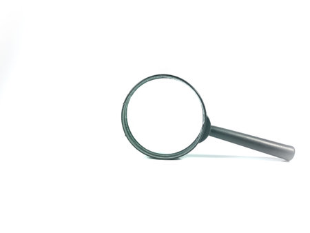 Magnifying glass isolated on white background with copy space.