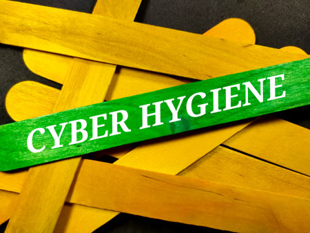 Colorful wooden stick with text CYBER HYGIENE on black background.の写真素材