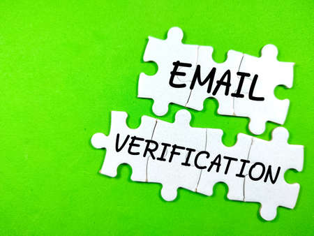 Text SOCIAL MEDIA on jigsaw puzzle with scissors on a yellow background.の写真素材