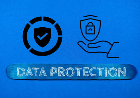 Business concept.Text INFORMATION SECURITY with magnifying glass on a yellow background.の写真素材