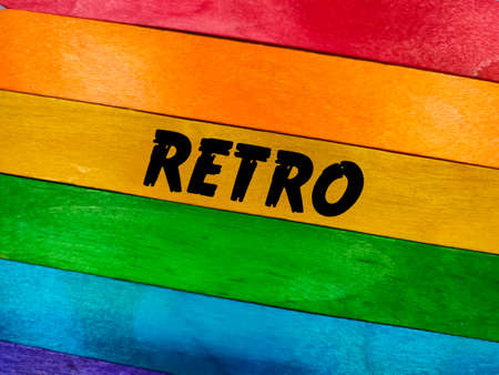 Text RETRO writing on colored ice cream sticks background. Trending photos concept.の写真素材