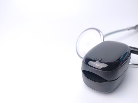 Malaysia, 27 March 2022: Stethoscope and oximeter on a white background.のeditorial素材