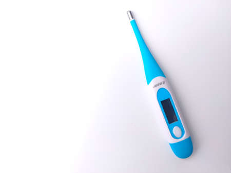 Malaysia, 27 March 2022: Digital Thermometer on a white background.のeditorial素材