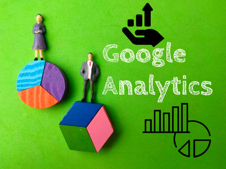 Malaysia,3 April 2022: Miniature people and icon with text Google Analytics on green background.のeditorial素材