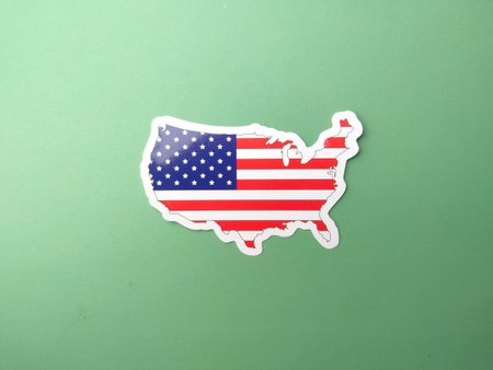 United state america flag stickers on a green background.の写真素材