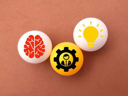 Ping pong ball with idea and brain icons. the concept of innovationの写真素材
