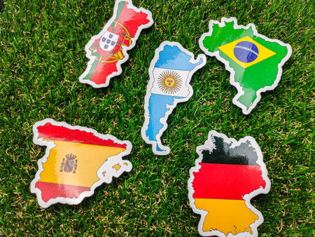 Portugal,German,Spain,Argentina and brazil flag sticker is on a green field.の写真素材