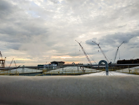 The view from the top of the storage tank for cooking oil and crude palm oil with sunset view.