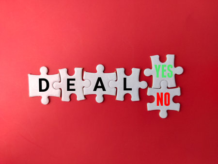 White puzzle with the word DEAL YES NO on red background. Business concept.の写真素材