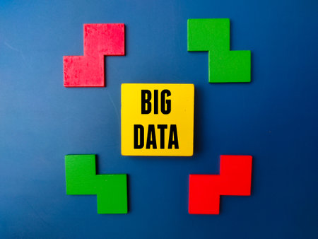 Colored wooden puzzle and wooden cube with word BIG DATA. Business concept.の写真素材
