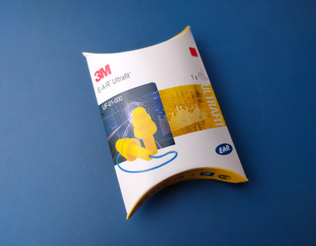 Lumut, Perak - June 30 2023 : Closeup a box of ear plugs from the 3M brand on a blue background.のeditorial素材