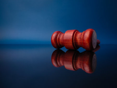 Wooden gavel with reflection on a black acrylic board. Justice and law conceptの写真素材
