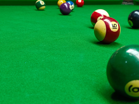 Closeup of the snooker ball on the green snooker table
