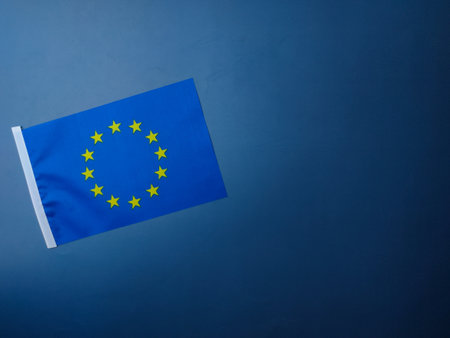 Top view European union flag on a blue background with copy and text space.の写真素材