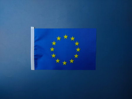 Top view European union flag on a blue background.