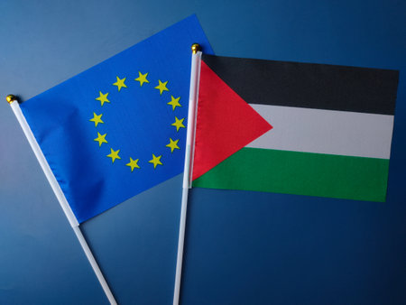 Top view european union and palestine flag on a blue background.の写真素材