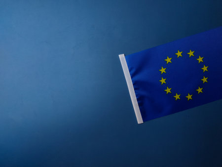Top view European union flag on a blue background with copy and text space.の写真素材