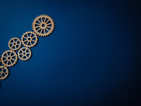 Top view of wooden gear on a blue background.