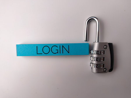 The image features a combination padlock next to a blue strip of paper with the word LOGIN written...