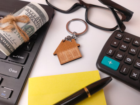 Collection of items related to personal finance and the process of buying a home.の写真素材