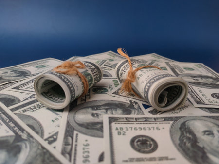 The image displays United States one-hundred-dollar bills, the most valuable denomination in general circulation.の写真素材