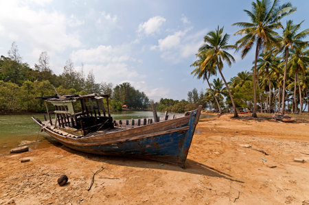Stranded Fishing Boat at Terengganu, Malaysia during Sunny day.の写真素材