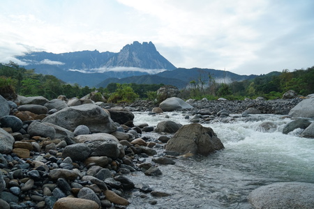 Melangkap River with Mount Kinabalu on backgroundの写真素材