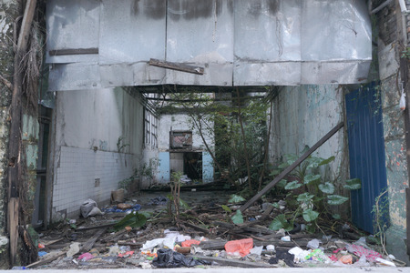 Abandoned building with a lot of rubbish and dirty.の写真素材