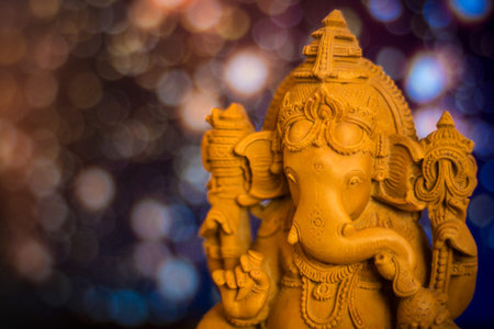 idle of lord ganesha on glitter background